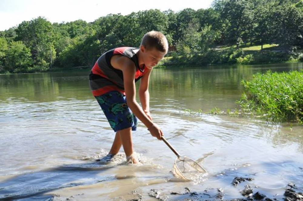 TOP KANSAS SWIM CAMP: Wildwood Outdoor Education Center is a Top Swim Summer Camp located in La Cygne Kansas offering many fun and enriching Swim and other camp programs. 